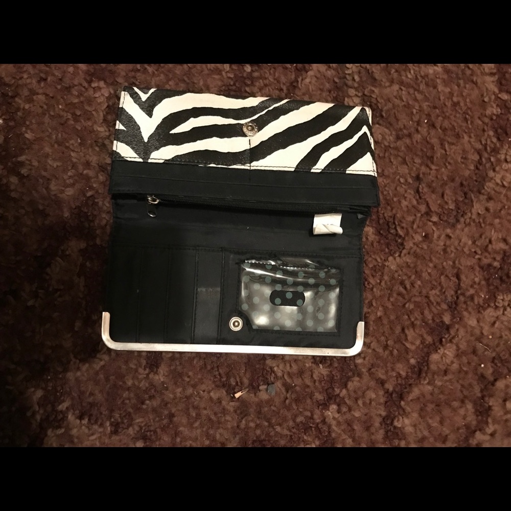 2 wallets. - Picture 3 of 7
